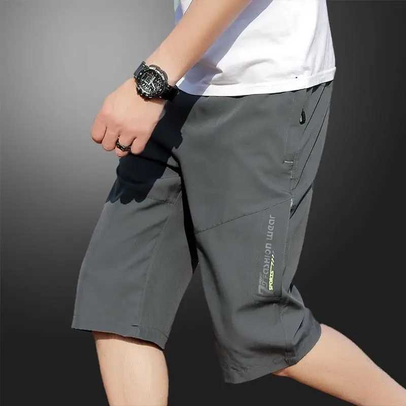 Mens work pants knee length pants zippered pockets summer shorts hiking and jogging elastic waist sportswearT251015