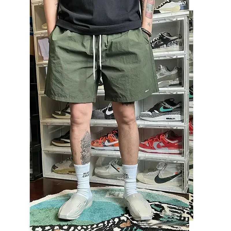 JJJJOUND joint nylon solid color classic quickdrying shorts drawstring loose sports beach pants men and women couple trendT251015