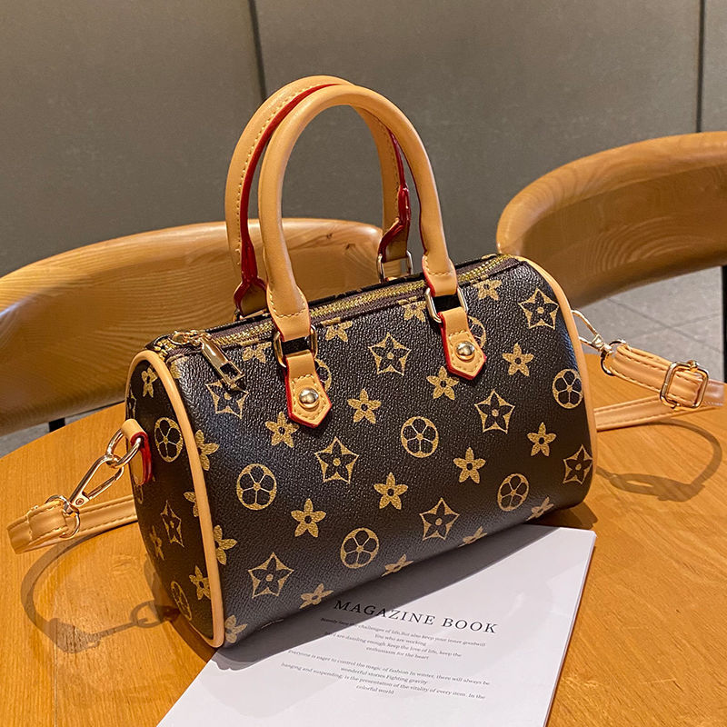Fashionable new design single shoulder Boston bag ladies' socialite party elegant bag trendy and versatile printed handbag free shipping