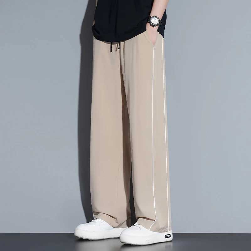 Summer ice silk thin section pants mens Hong Kong style loose splicing casual sports widelegged pants elastic speed pants J251203