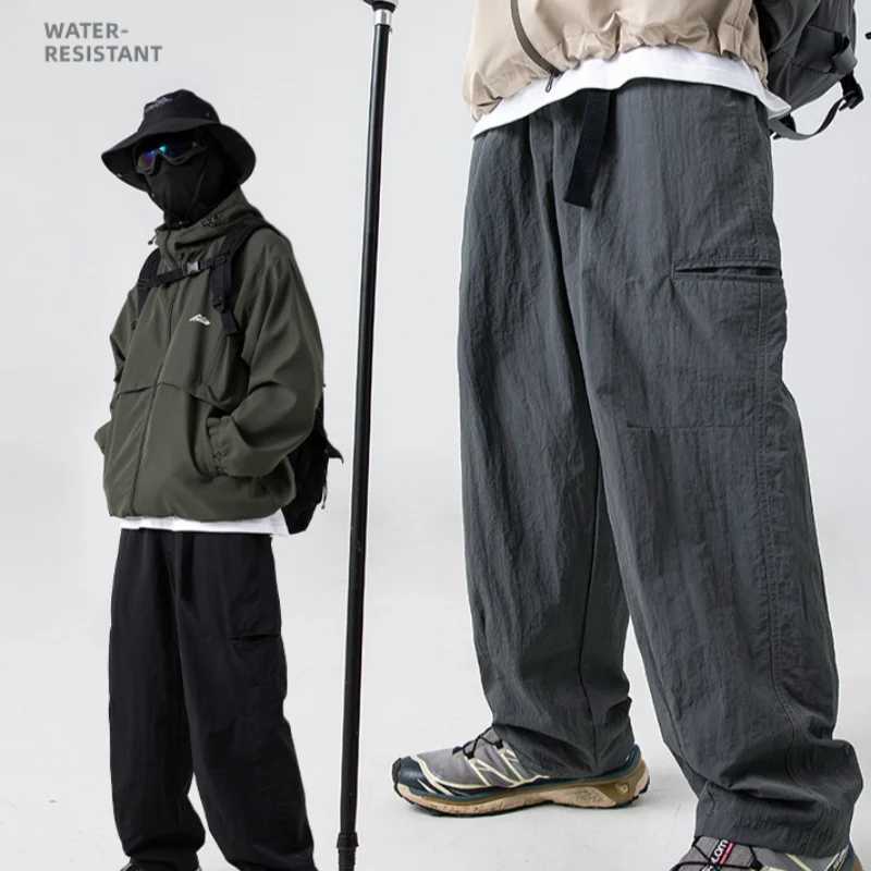 2025 New Japanese outdoor functional casual pants for men in spring with anti splash side pockets and loose workwear pants J251203