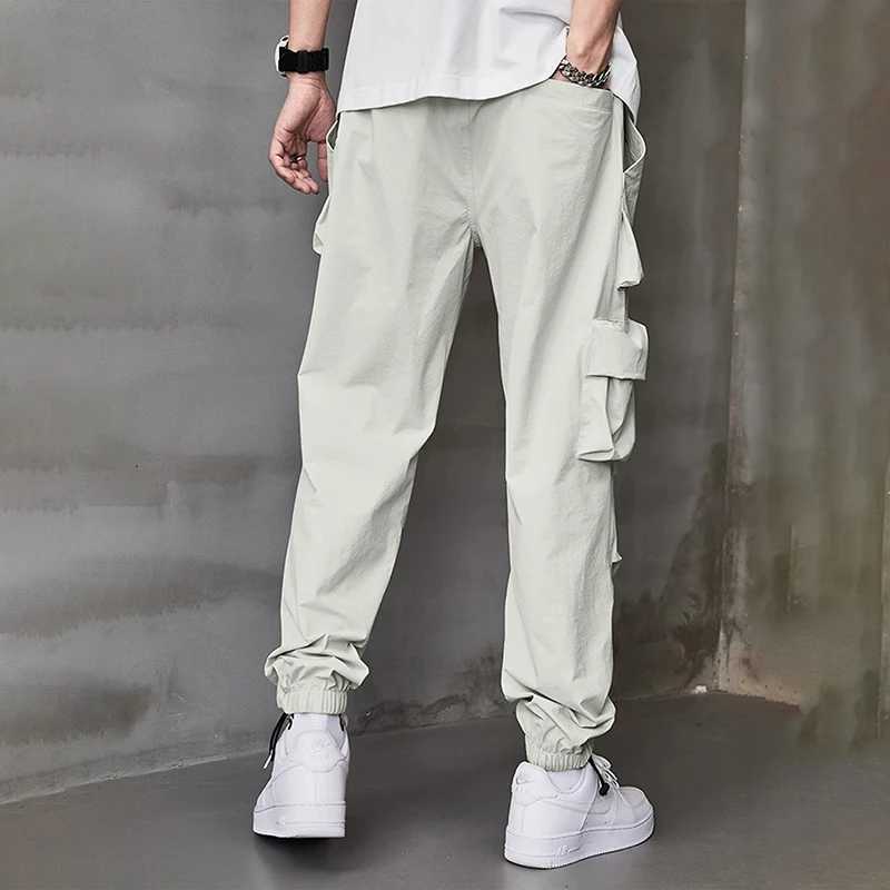 Mens work pants fashion brand Spring and Autumn new multi pocket American sports pants wrapped leg pants mens casual pants J251203
