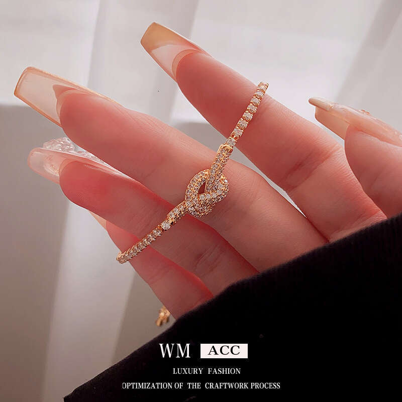 Real Gold Plated Zircon Knot Hollow Simple Elegant Bracelet Light High-end Sense Women's Jewelry ddmypluto