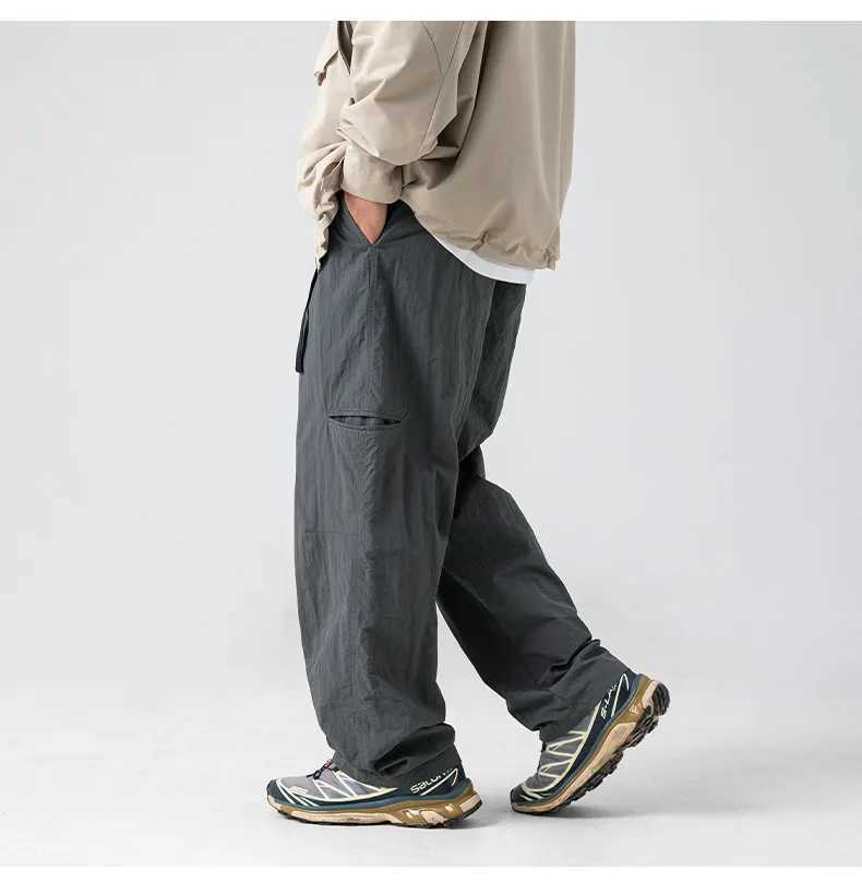 2025 New Japanese outdoor functional casual pants for men in spring with anti splash side pockets and loose workwear pants J251203