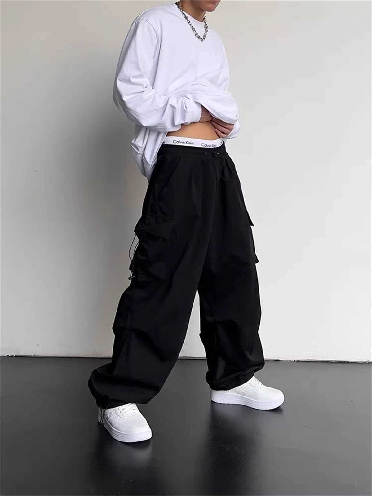 American Spring Summer Men Casual Cargo Pants Pockets Plus Size Black Out Door Elasticity Sports Oversize Pants 46 48 50 J251203