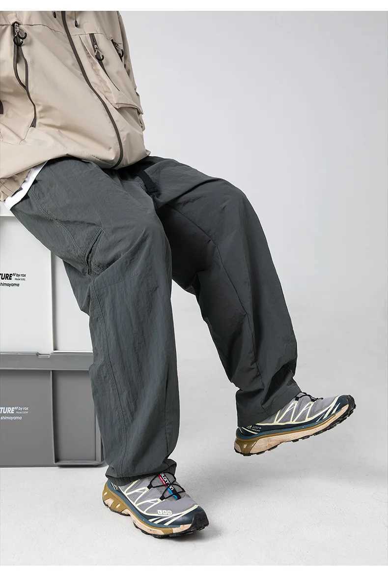 2025 New Japanese outdoor functional casual pants for men in spring with anti splash side pockets and loose workwear pants J251203