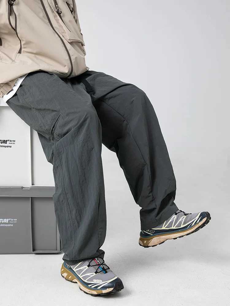 2025 New Japanese outdoor functional casual pants for men in spring with anti splash side pockets and loose workwear pants J251203