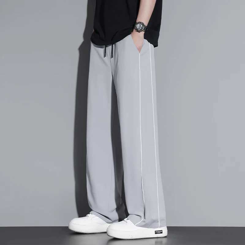 Summer ice silk thin section pants mens Hong Kong style loose splicing casual sports widelegged pants elastic speed pants J251203