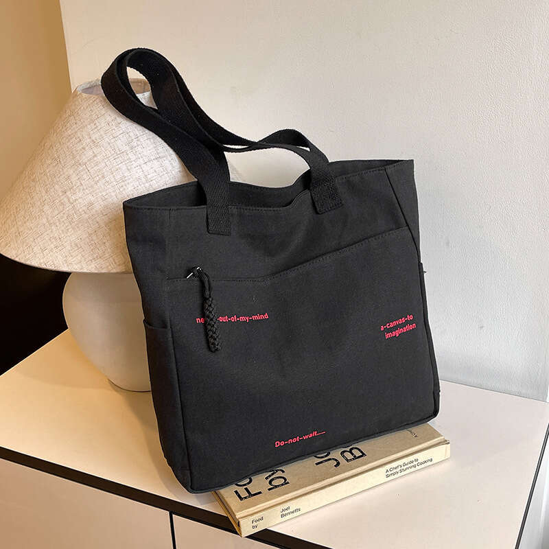 2025 New Commuting Large Capacity Single Shoulder Canvas for Women Korean Version Versatile Handheld Tote Bag