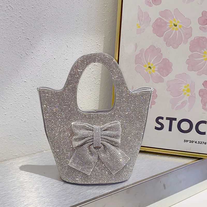 Stylish French shiny inflexible diamondencrusted bow bucket bag simple celebrity personalized portable messenger bag Z251017