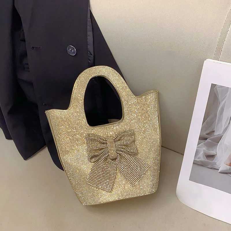 Stylish French shiny inflexible diamondencrusted bow bucket bag simple celebrity personalized portable messenger bag Z251017