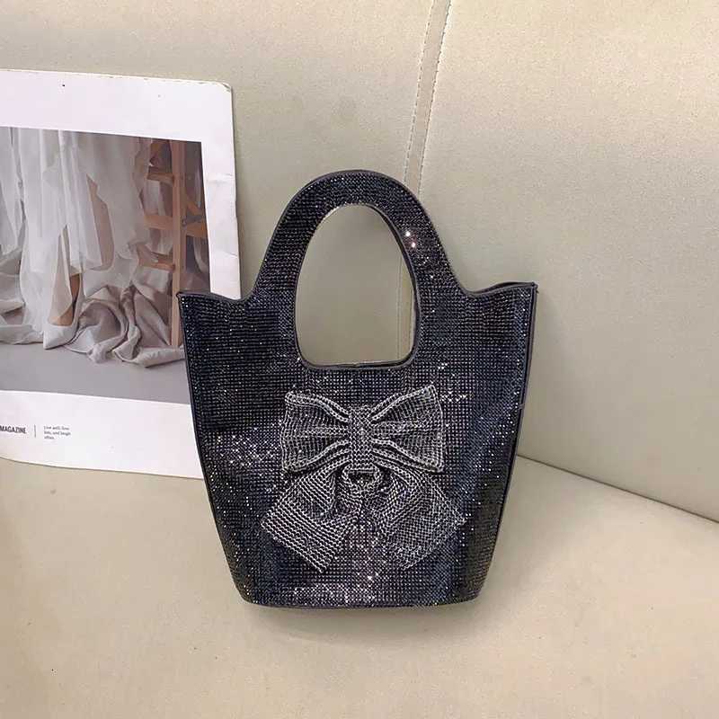 Stylish French shiny inflexible diamondencrusted bow bucket bag simple celebrity personalized portable messenger bag Z251017