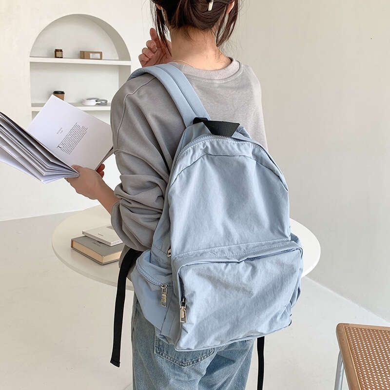Korean Casual Lightweight Commuter Large Capacity Harajuku Style Backpack Solid Color Simple Student Nylon Cloth School Bag B5