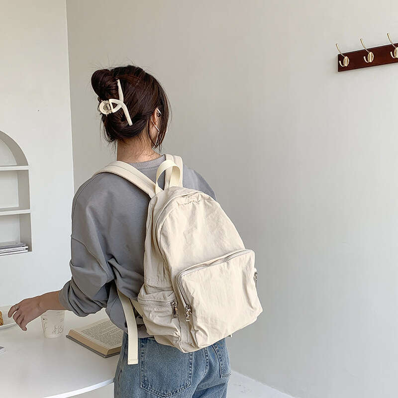 Korean Casual Lightweight Commuter Large Capacity Harajuku Style Backpack Solid Color Simple Student Nylon Cloth School Bag B5