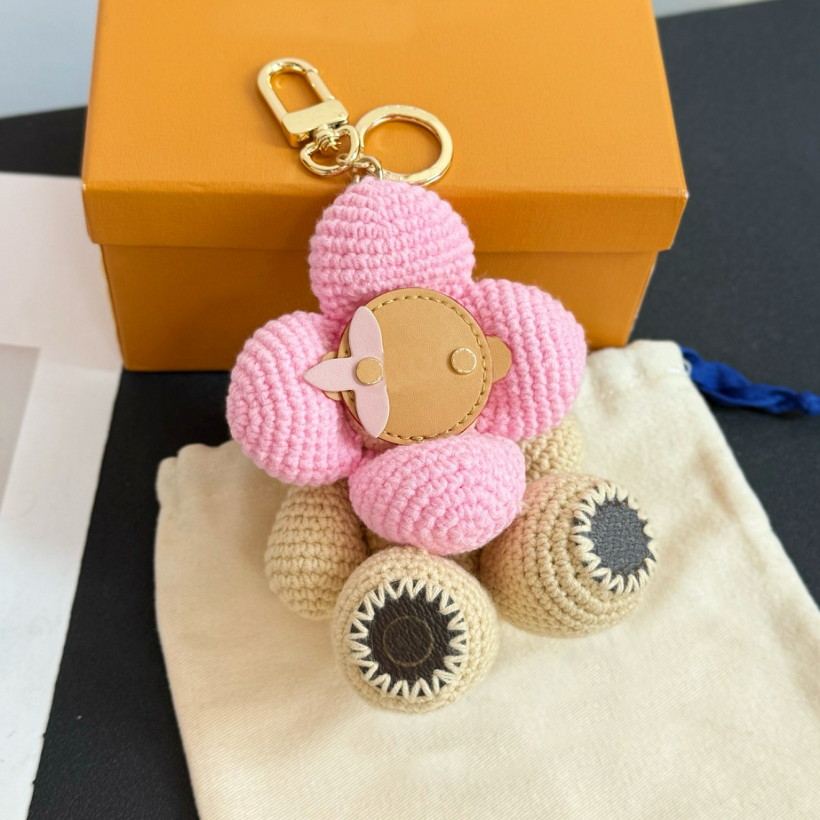 Keychains Lanyards Luxury Sun Flower Bag Charms Designer handmade Weave Sunflower Doll Keychains Woman Mans Purse Charms Key Chain Cartoon Pendant