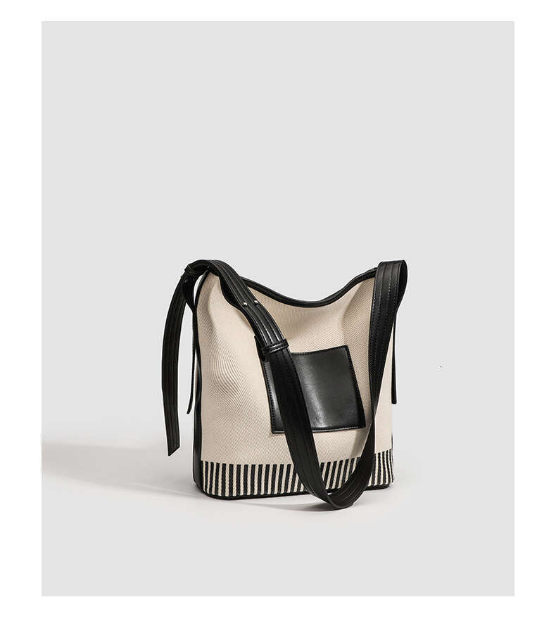 2024 New Small Niche Canvas Patchwork Large Capacity Bucket Wide Strap Fashion Versatile Striped Single Designer Bags Shoulder Bag