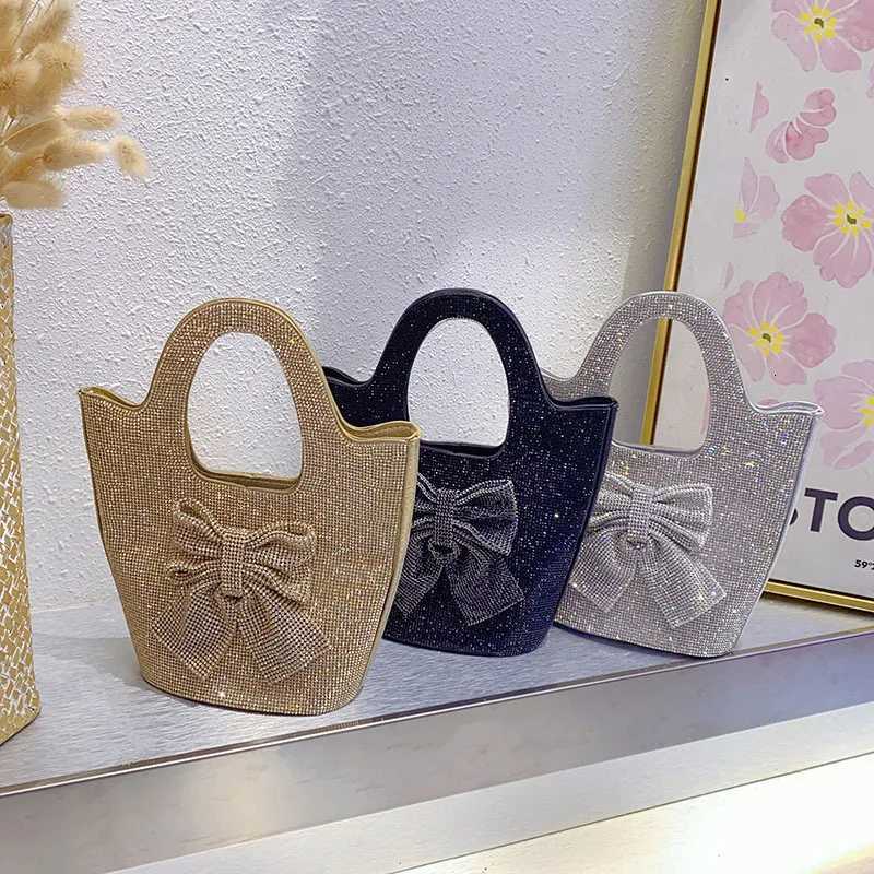 Stylish French shiny inflexible diamondencrusted bow bucket bag simple celebrity personalized portable messenger bag Z251017