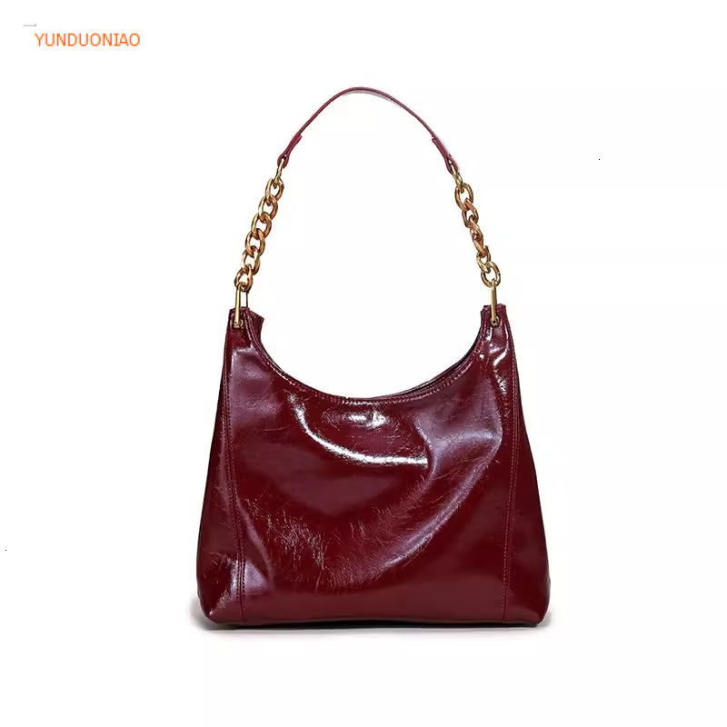 Autumn and winter new minimalist style designer bag new glossy leather red women's shoulder bag fashion trend luxury handbag