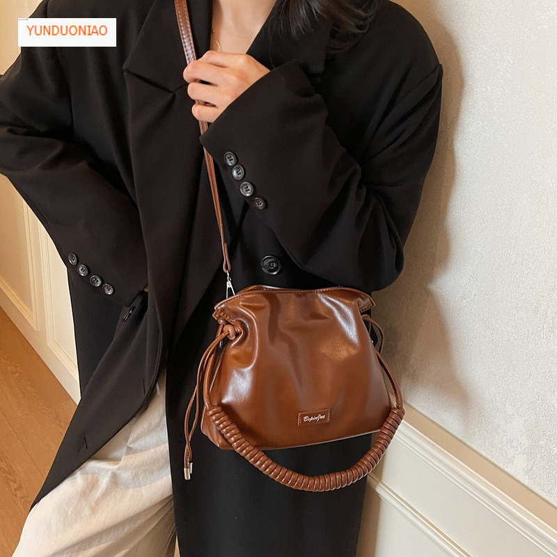 Autumn and winter new designer bag luxury handbag woven drawstring women's crossbody bag new fashion retro women's shoulder bag bucket bag