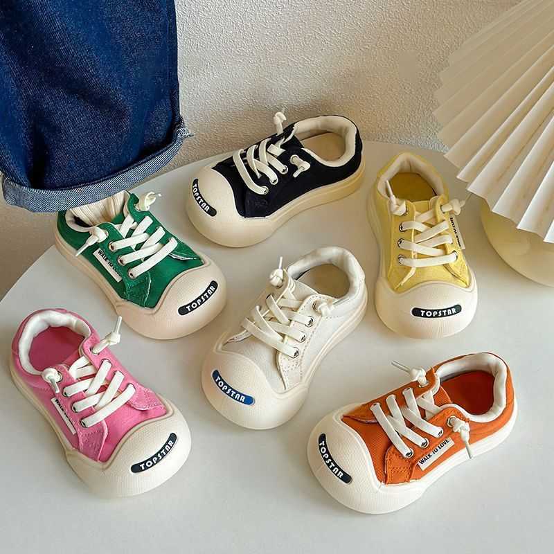 New Childrens Ugly and Cute Canvas Shoes Spring and Autumn Boys and Girls Velcro Board Shoes Korean Edition Laughing Baby White Shoes W251017