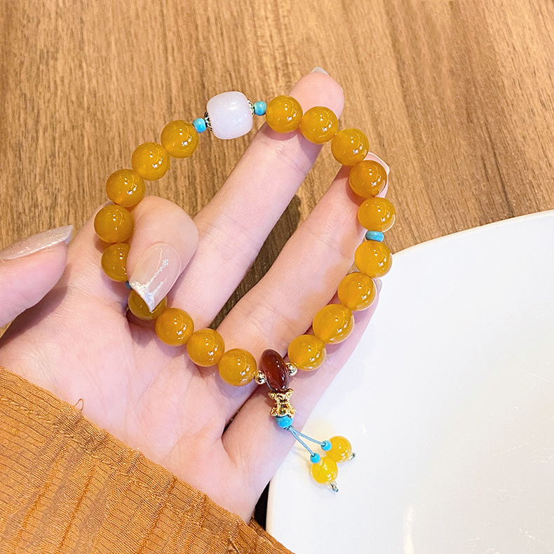 Traditional Chinese Fashion Accessory: Handcrafted Yellow Carneleian Charm