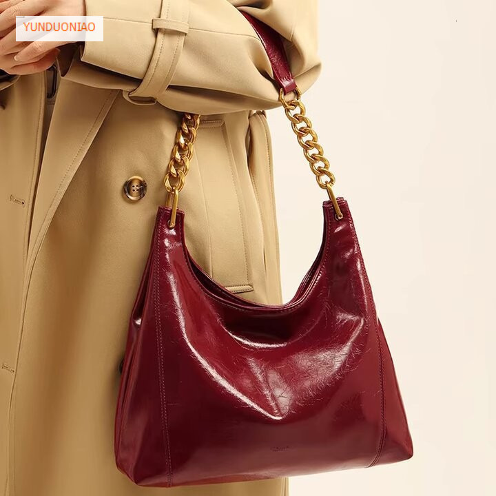 Autumn and winter new minimalist style designer bag new glossy leather red women's shoulder bag fashion trend luxury handbag