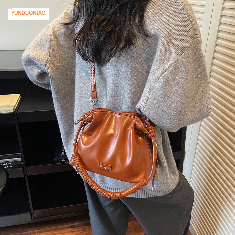 Autumn and winter new designer bag luxury handbag woven drawstring women's crossbody bag new fashion retro women's shoulder bag bucket bag