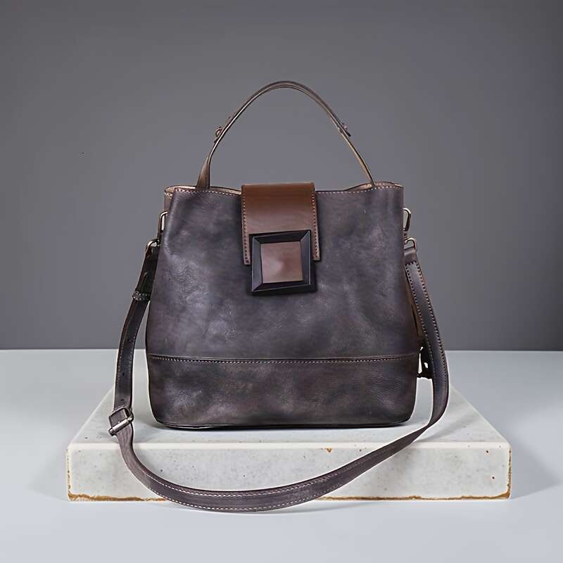 A Classic Style Genuine Leather Crossbody Suitable For Women, With Adjustable Shoulder Strap, Zipper Closure, Polyester Lining, Manufactured In Guangz
