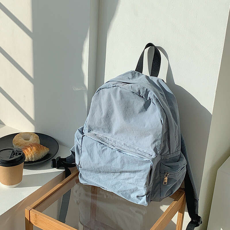 Korean Casual Lightweight Commuter Large Capacity Harajuku Style Backpack Solid Color Simple Student Nylon Cloth School Bag B5