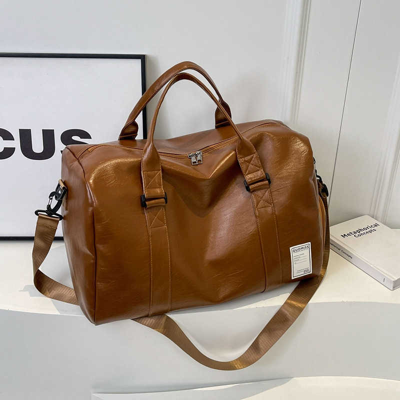 Handheld travel bag for men, high-end and large capacity sports and fitness bag, women's leather travel clothes, luggage bag for men