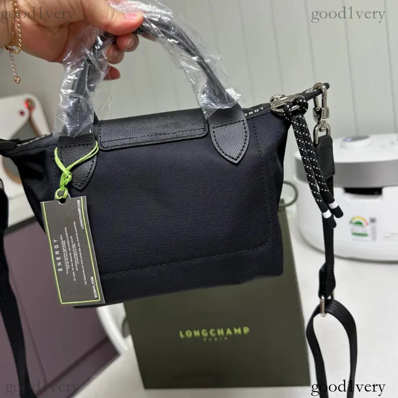 5A French Longchamp Mini Dumpling Commute Versatile Crossbody Handbag Womens Small Bag With Perforated Shoulder Strap Large Shopping Bag Portable shopping Long