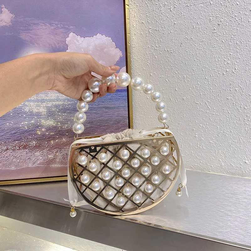 Stylish and simple beaded pearl bag dinner bag hollow semicircular handbag metal bucket bag Z251017