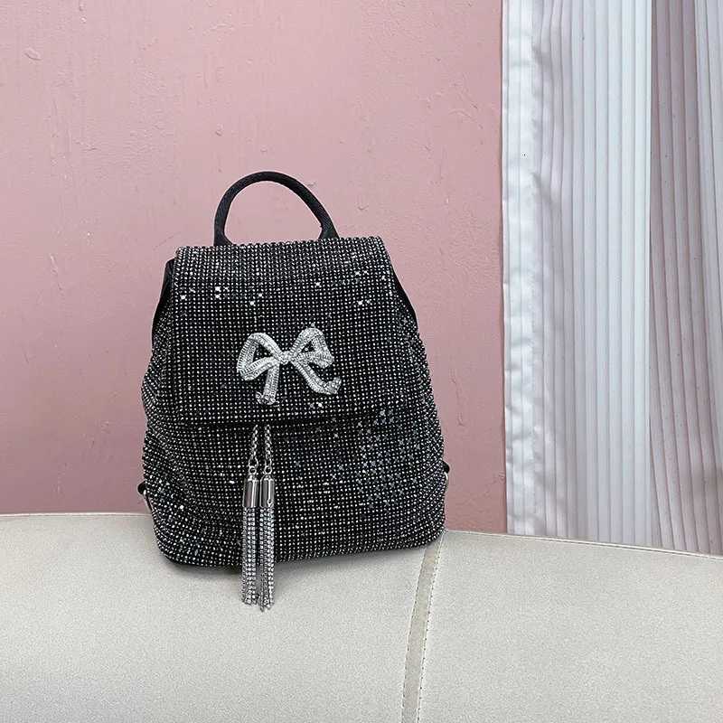 Metal bow shiny ineffectual diamondencrusted leisure campus versatile celebrity chain largecapacity backpack Z251017