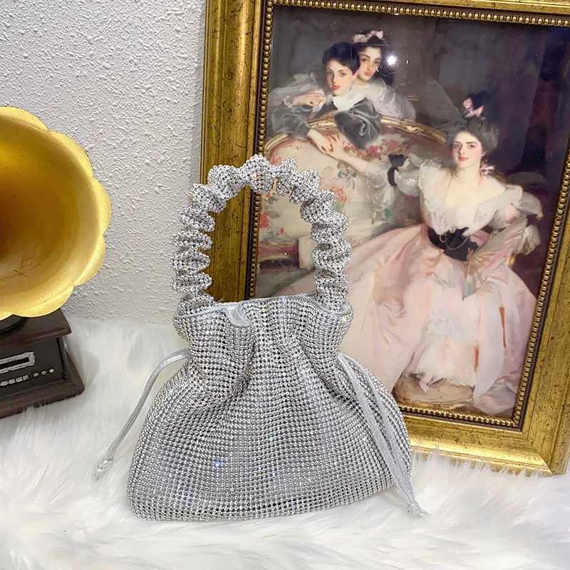 sense trend personality light luxury dumpling bag niche design shiny and inflexible diamondencrusted handbag Z251017