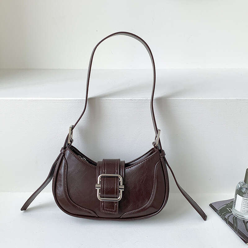 Women's Autumn Winter New Creative Single Shoulder Underarm Commuting Fashion Niche Baguette Crescent Bag High-End Feel B5