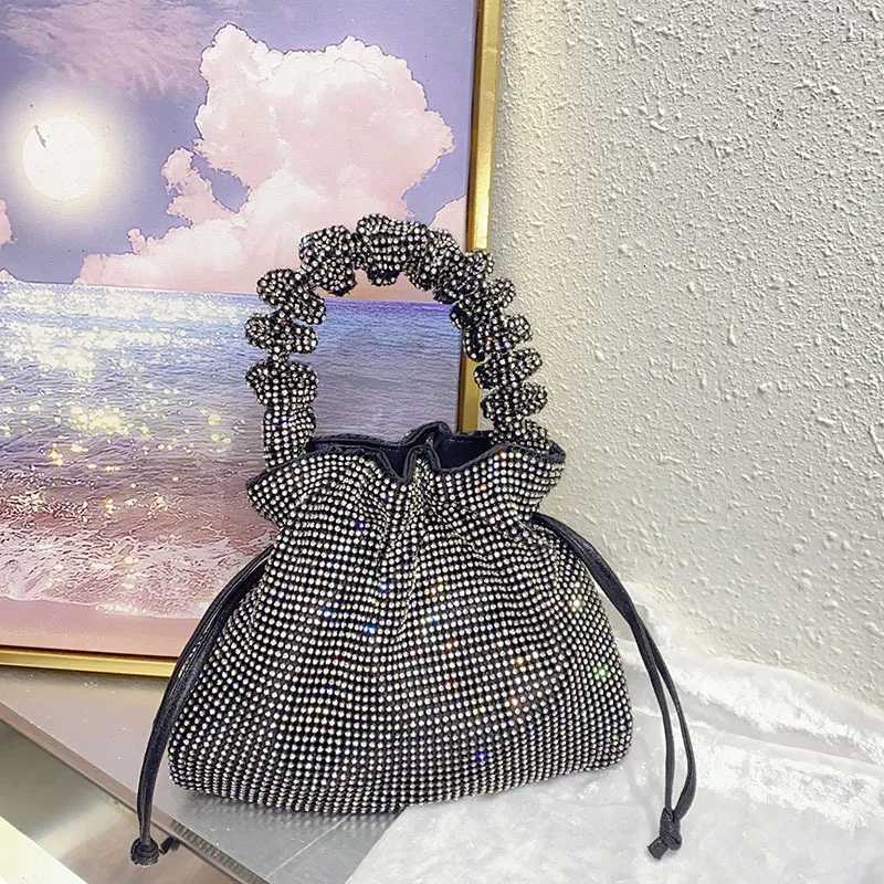 sense trend personality light luxury dumpling bag niche design shiny and inflexible diamondencrusted handbag Z251017