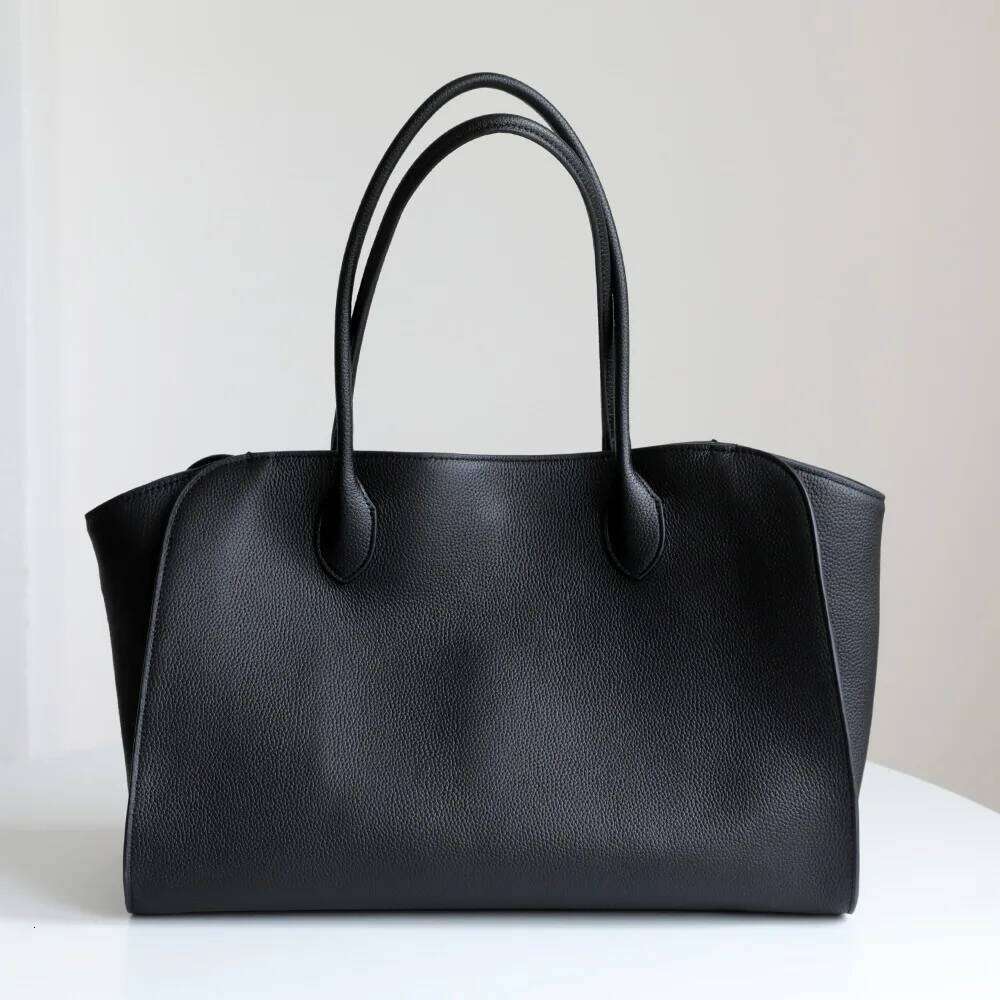 High-end Large-capacity First-layer Cowhide Fashionable Simple Handbag Shopping Tote Armpit Bag Commuting Leisure Versatile