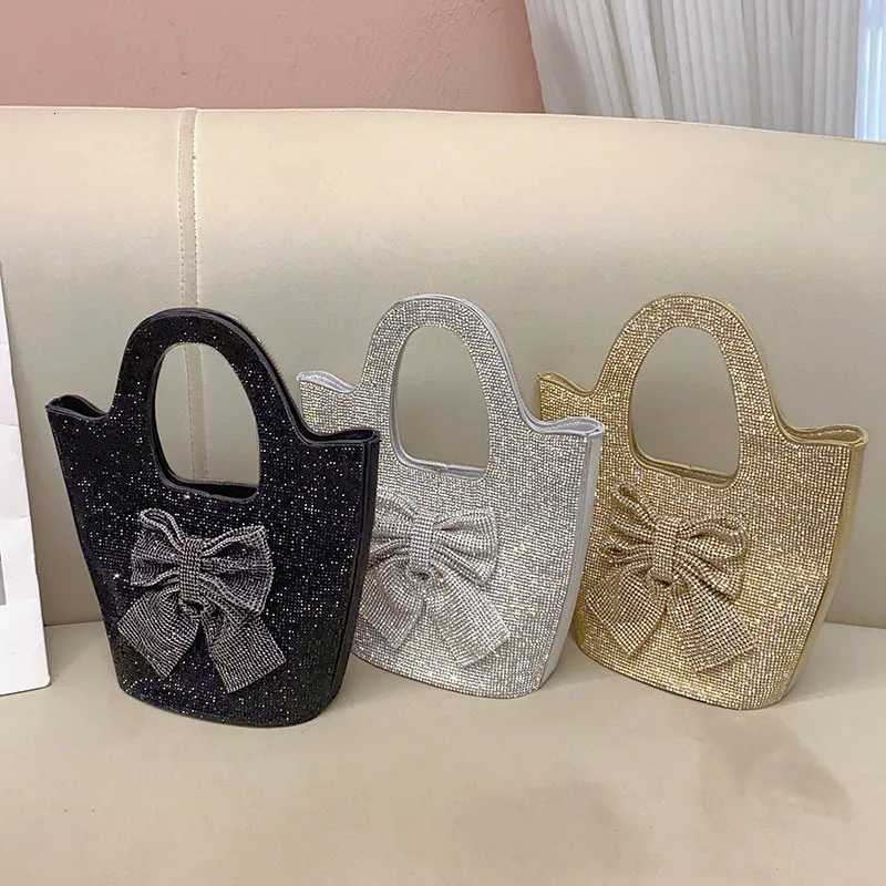 Stylish French shiny inflexible diamondencrusted bow bucket bag simple celebrity personalized portable messenger bag Z251017