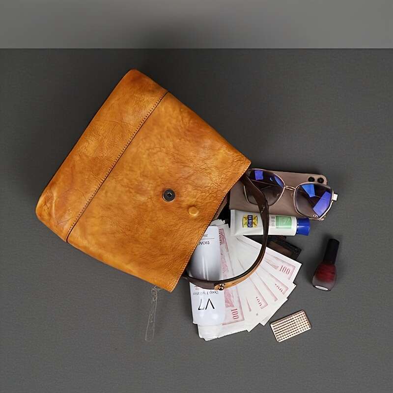 A Classic Style Genuine Leather Crossbody Suitable For Women, With Adjustable Shoulder Strap, Zipper Closure, Polyester Lining, Manufactured In Guangz