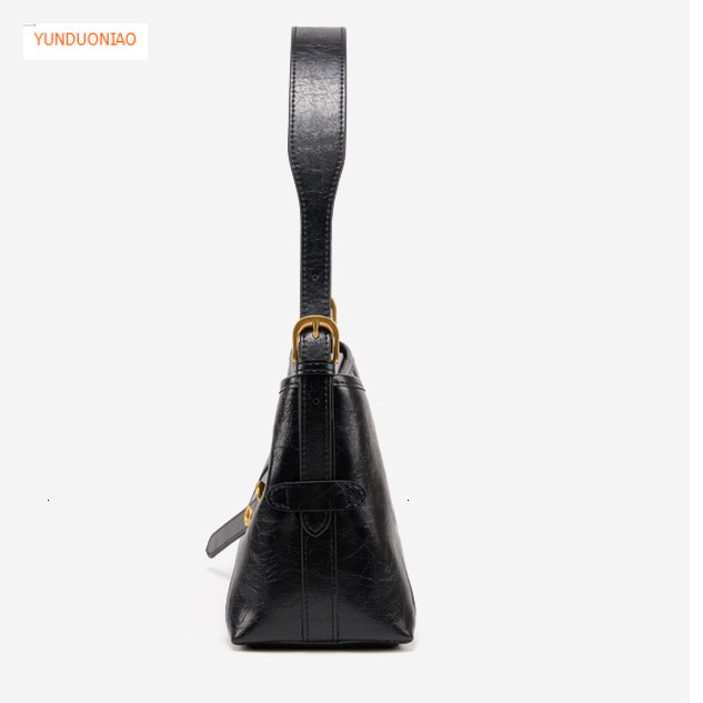 Autumn and winter new designer bag wax cowhide retro style women's shoulder bag fashion trend crossbody armpit bag versatile commuting bag