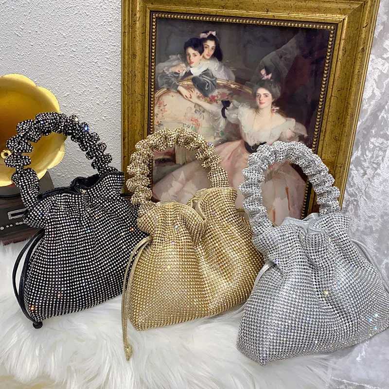 sense trend personality light luxury dumpling bag niche design shiny and inflexible diamondencrusted handbag Z251017