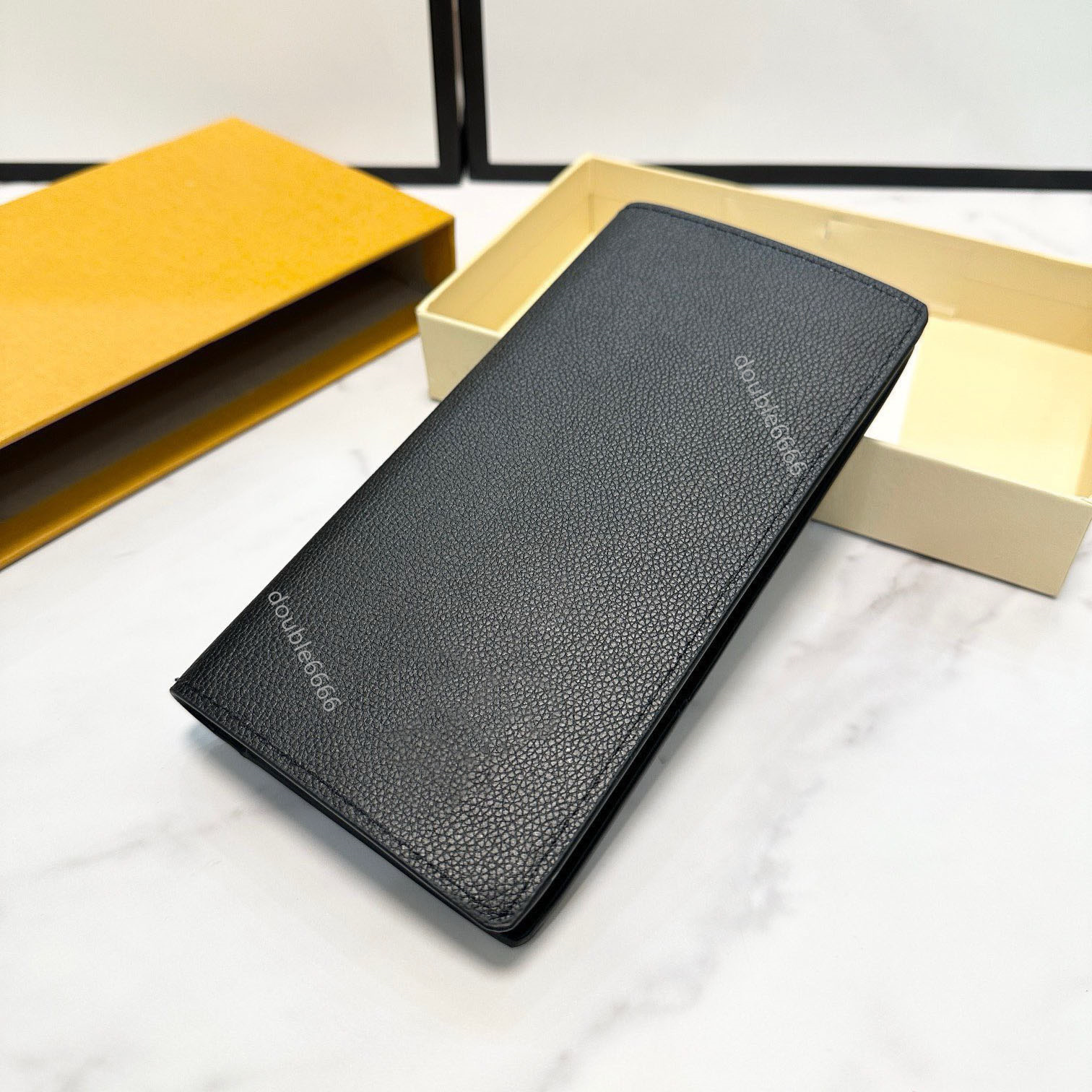 Designer leather wallets for men and women available in long and short styles coin purses key holders clutch bags checkbook wallets passport holders