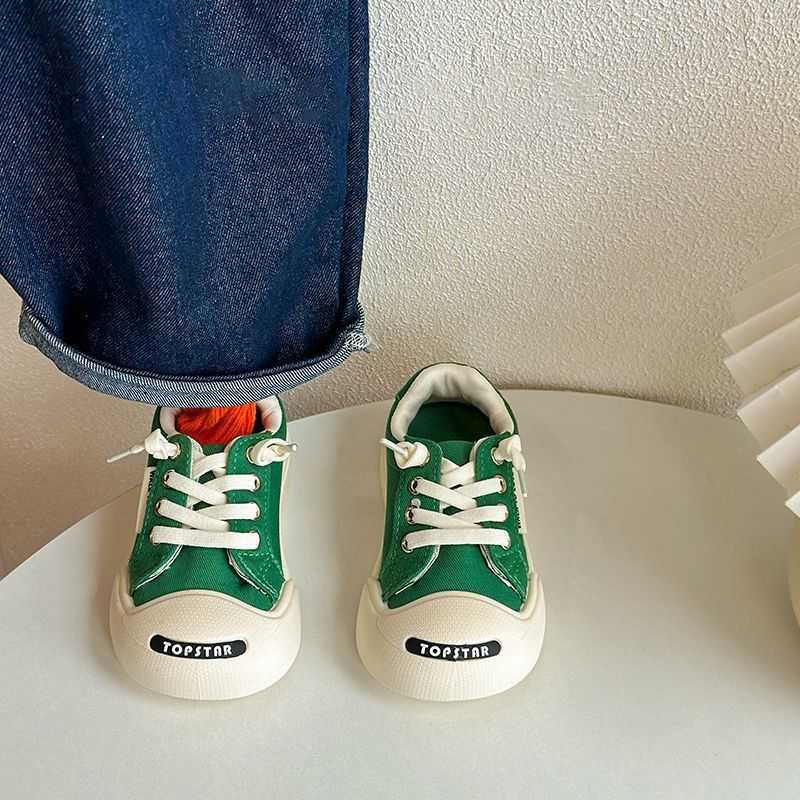 New Childrens Ugly and Cute Canvas Shoes Spring and Autumn Boys and Girls Velcro Board Shoes Korean Edition Laughing Baby White Shoes W251017