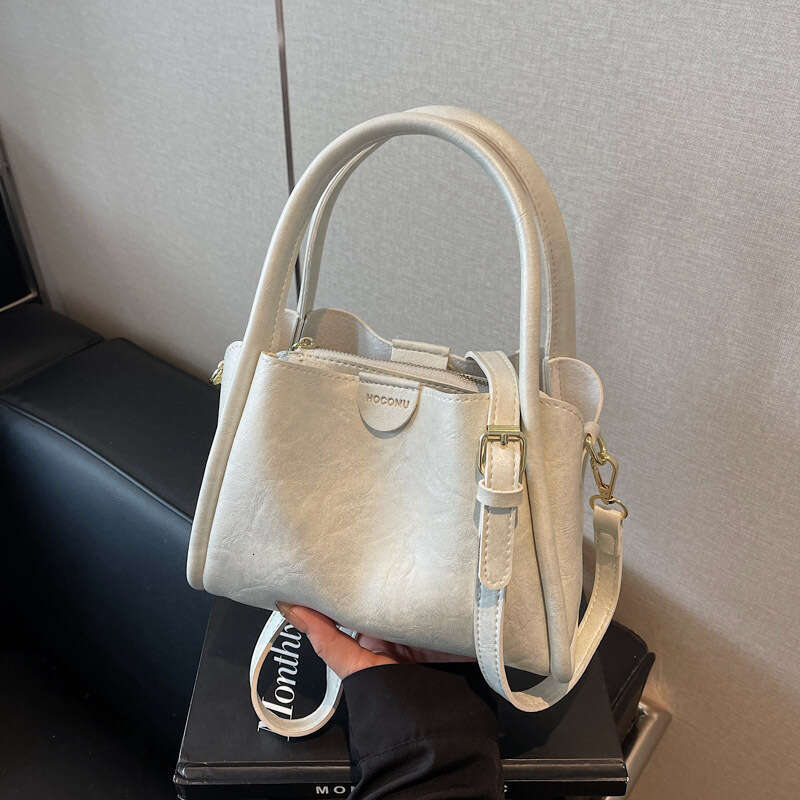 2025 Fashion Korean Version Simple Elegant Handheld Bucket Casual Versatile Shoulder Crossbody Women's Bag