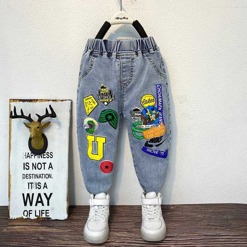 Boys Graffiti Stretch Jeans Spring and Autumn New Childrens AllMatch Trendy Brand Pants Boys Foreign Trade CrawlerT251017