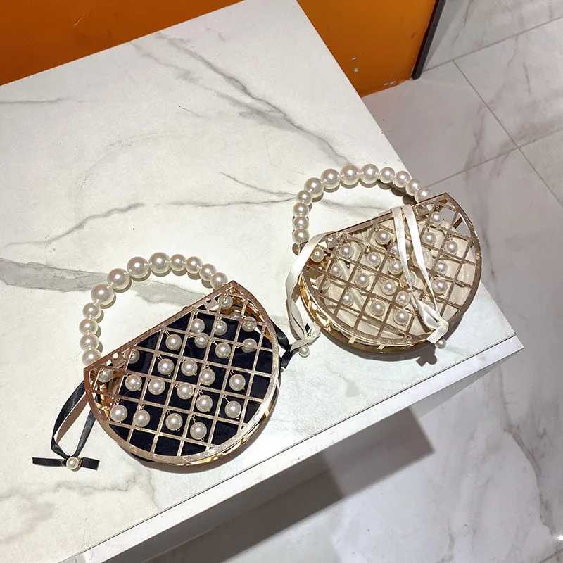 Stylish and simple beaded pearl bag dinner bag hollow semicircular handbag metal bucket bag Z251017
