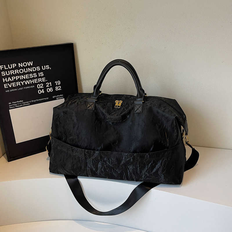 2025 New Simple Multifunctional Storage Travel Handbag for Girls Large Capacity Carry-on Luggage Bag 250415