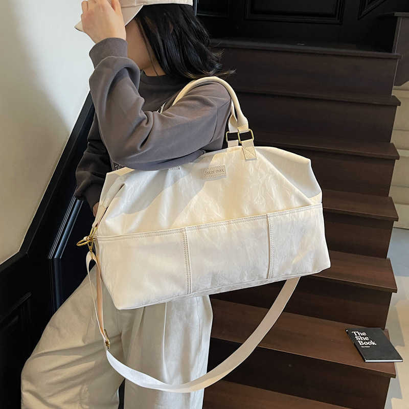 2025 New Simple Multifunctional Storage Travel Handbag for Girls Large Capacity Carry-on Luggage Bag 250415