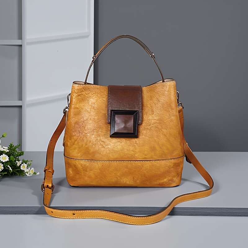 A Classic Style Genuine Leather Crossbody Suitable For Women, With Adjustable Shoulder Strap, Zipper Closure, Polyester Lining, Manufactured In Guangz