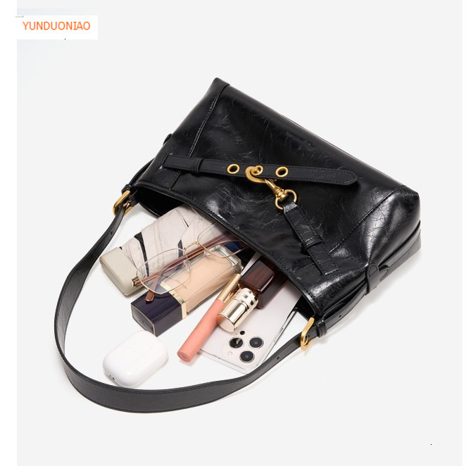 Autumn and winter new designer bag wax cowhide retro style women's shoulder bag fashion trend crossbody armpit bag versatile commuting bag